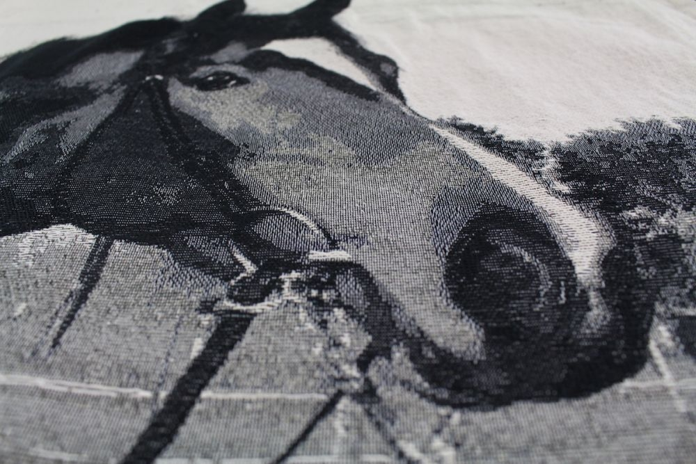 Detailed woven horse tapestry