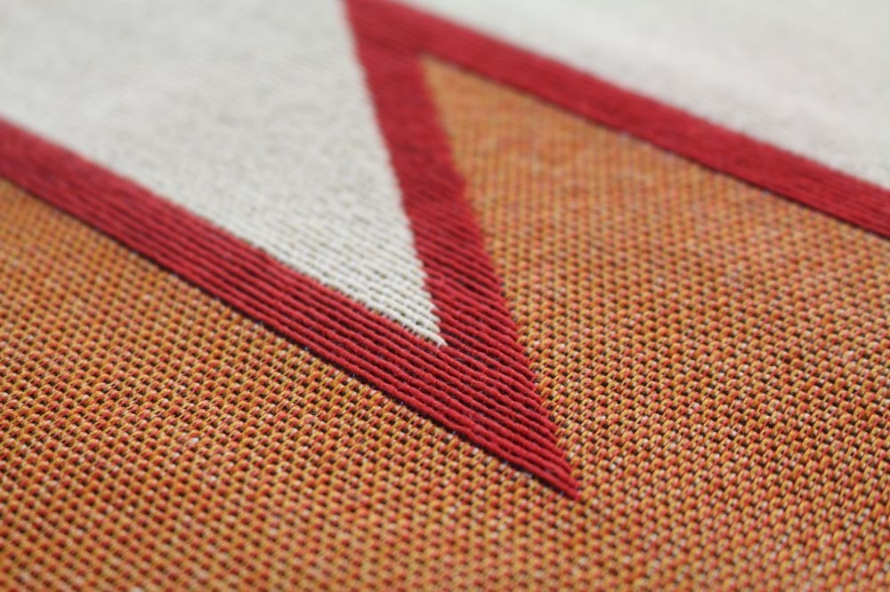 Textured woven fabric with geometric design