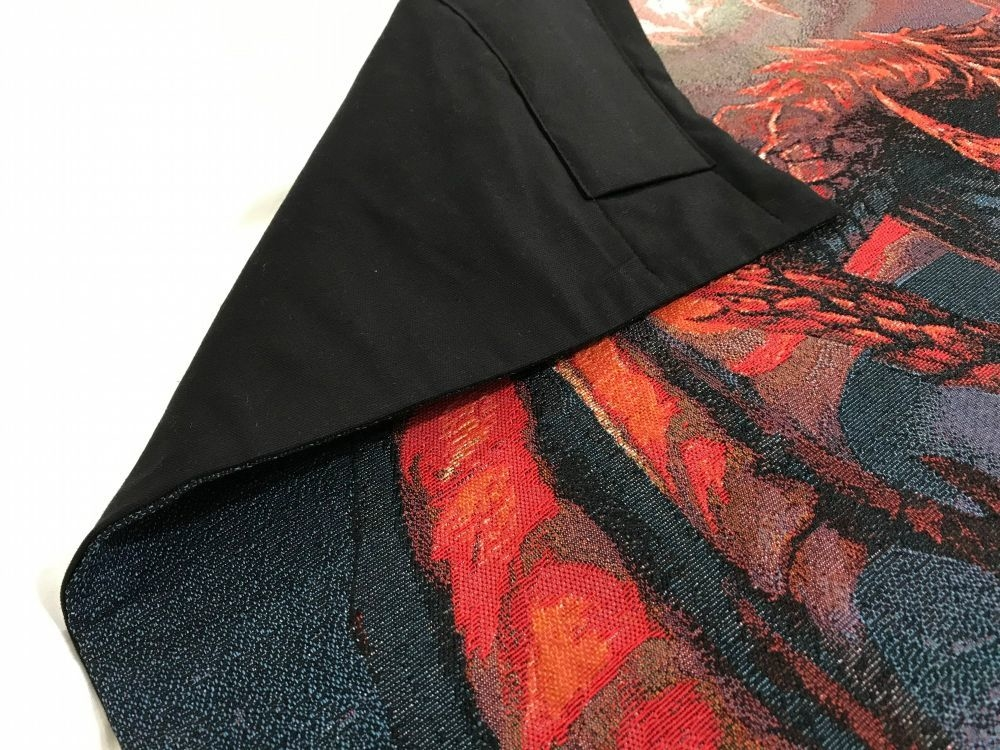 Fabric artwork with folded corner
