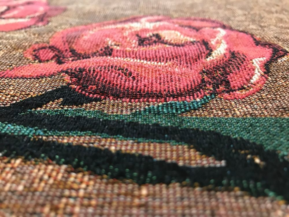 Close-up of a woven rose tapestry