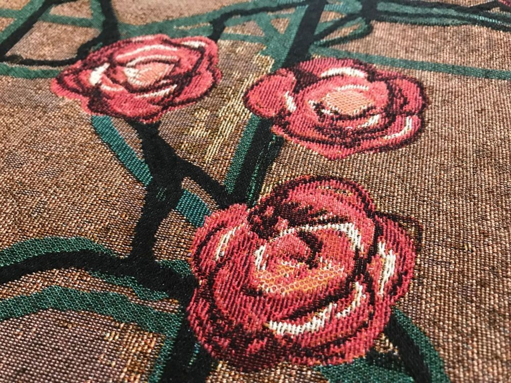 Woven fabric with red roses