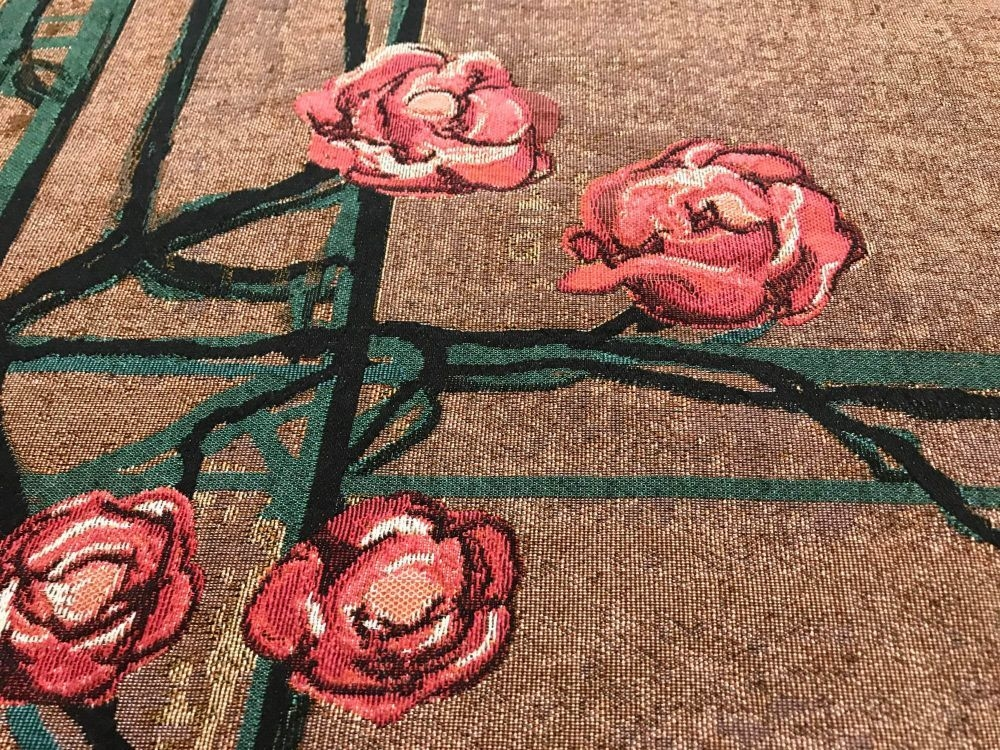 Woven roses on fabric