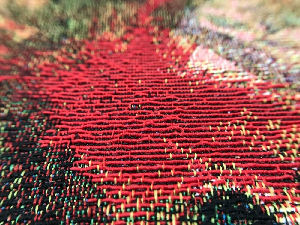 Red woven textile close-up