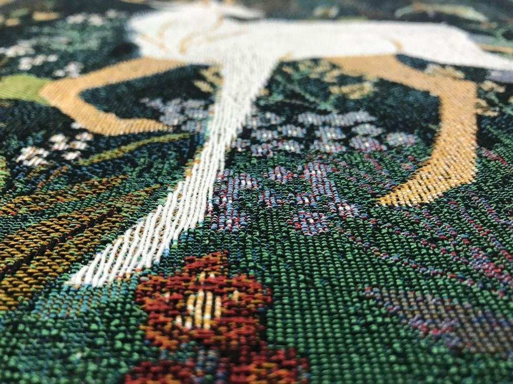 Tapestry close-up of a stag