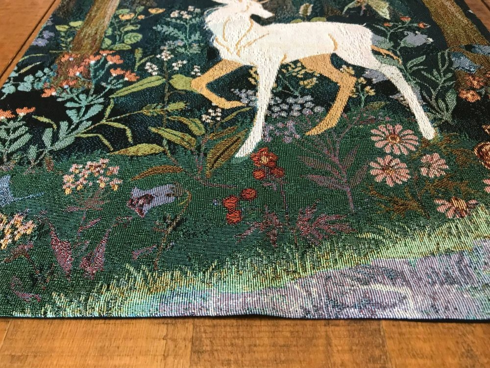 Woven deer tapestry close-up