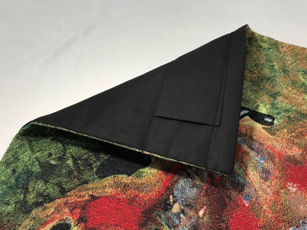 Black fabric backing, neatly stitched