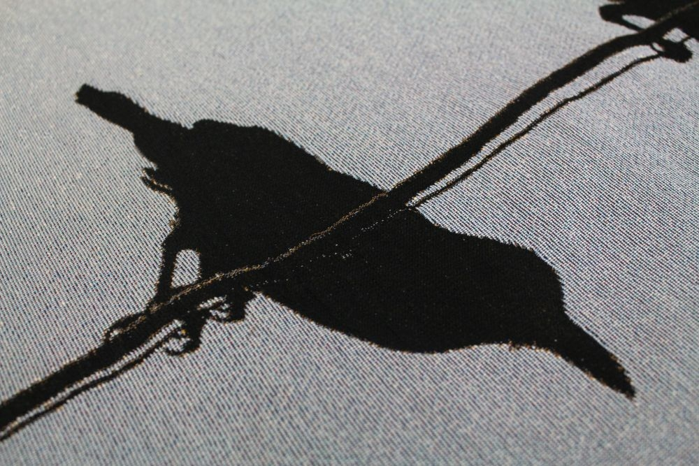 Crow on fabric